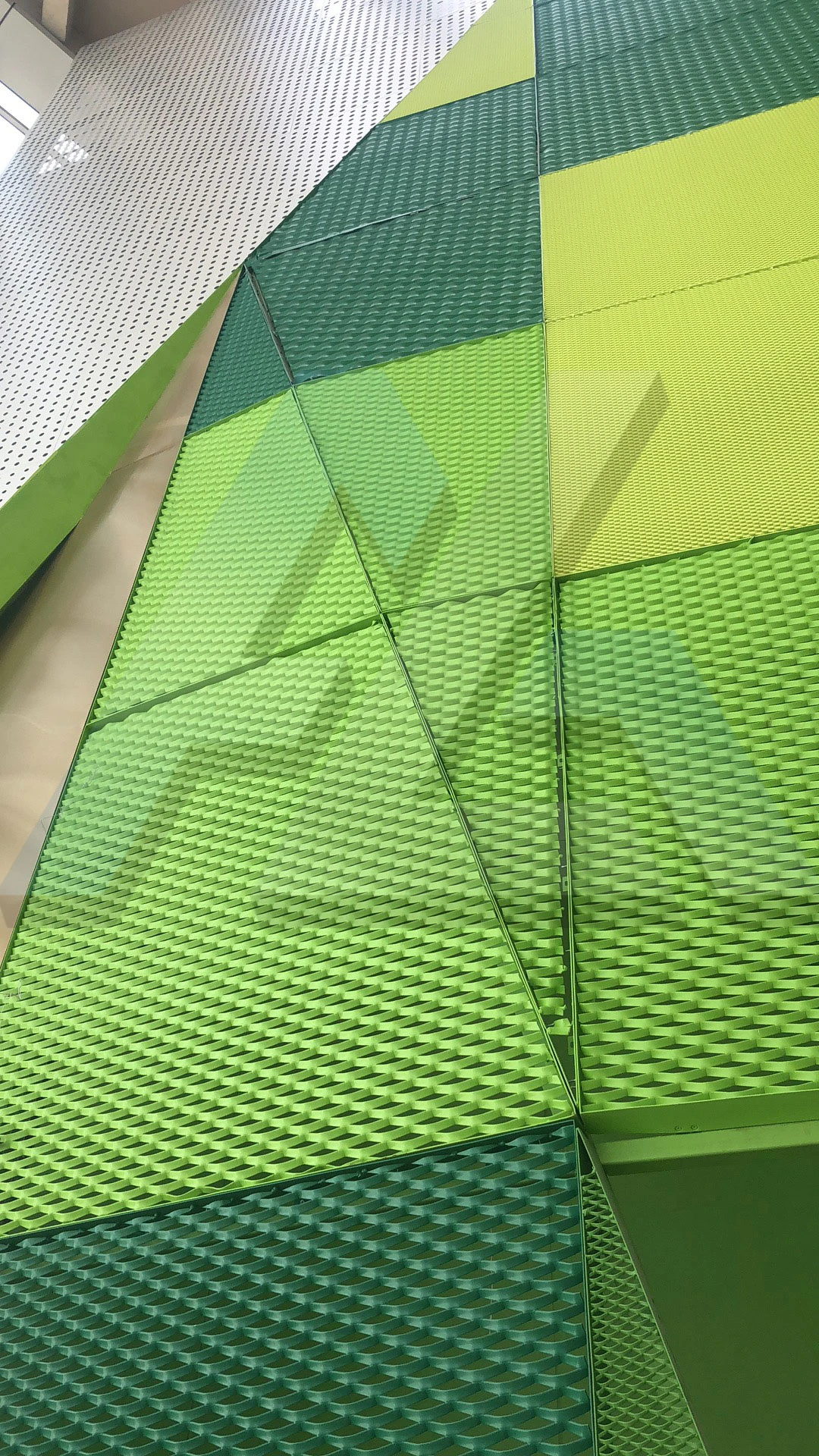 Expanded-mesh facade — customer photograph 3