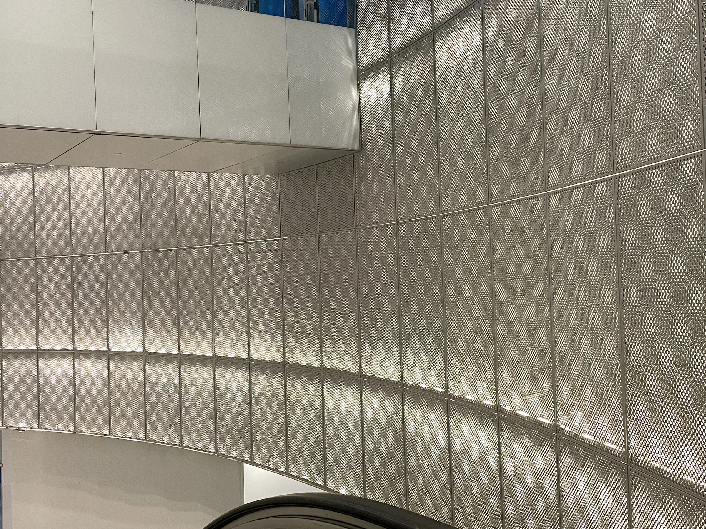 Perforated metal wall panels